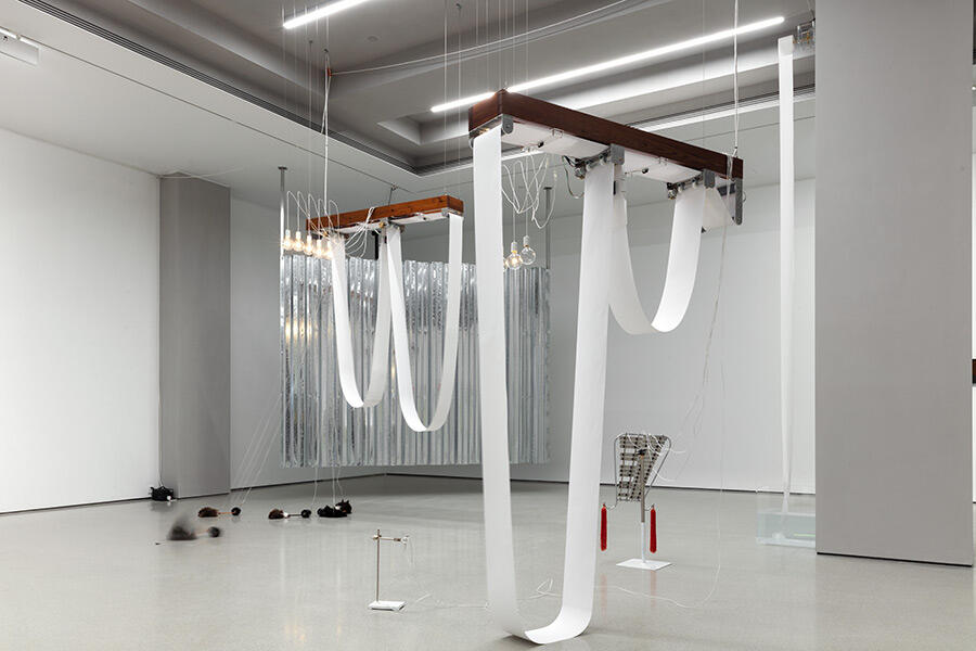 sculpture-installation-hanging-toilet-paper-from-ceilings